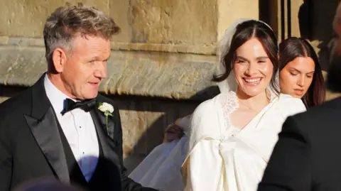 Gordon and Holly Ramsay arrive for her wedding to Adam Peaty at Bath Abbey