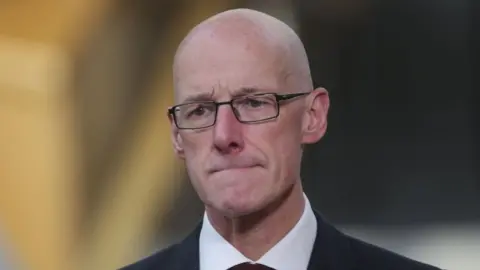 PA Media john swinney