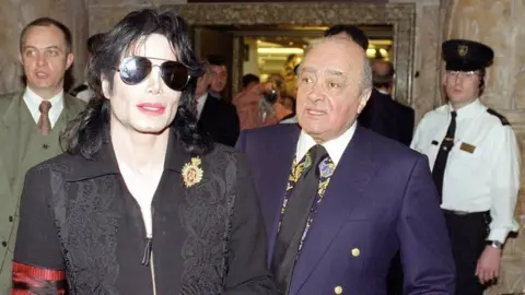 PA Michael Jackson and Mohammed Al Fayed