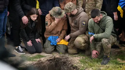 BBC/Lee Durant Ivan and others by Maksym's grave