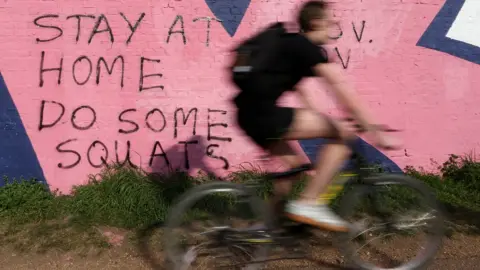 Getty Images Person cycling during coronavirus