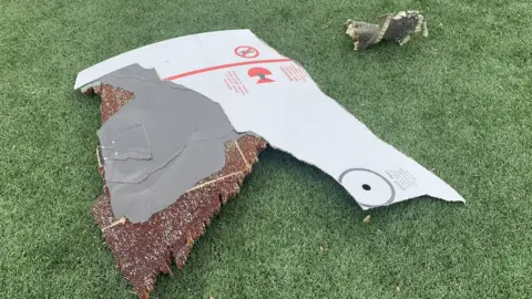 EPA A handout photo made available by Broomfield Police Department showing parts of the debris from the United Airlines flight 328