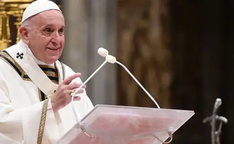 AFP Pope Francis leads a Christmas Eve mass in St Peter's Basilica