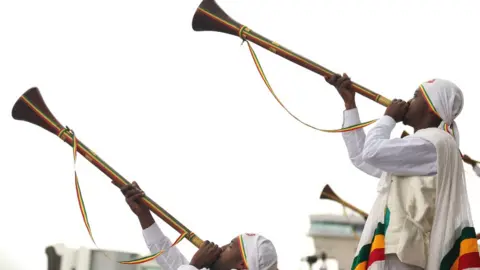 Reuters Choir members perform during a welcome ceremony for the patriarch of Ethiopian Orthodox Church, Bishop Merkorios