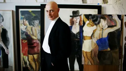 David Howells/Corbis/Getty David Remfry with paintings