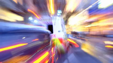 Getty Images Blurred ambulance