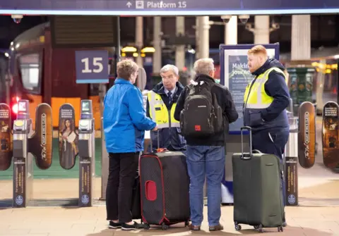Reuters Scotrail staff give advice