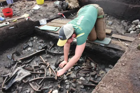 Archaeologists at the dig site