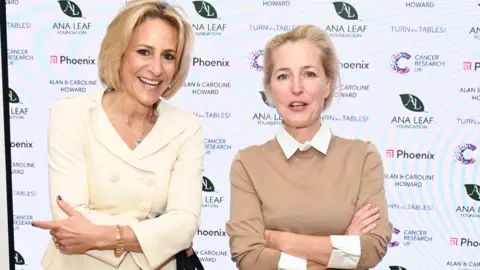 Getty Images Emily Maitlis and Gillian Anderson attend Turn The Tables 2023 hosted by Tania Bryer and James Landale in aid of Cancer Research UK at BAFTA 195 Piccadilly on March 6, 2023 in London, England.