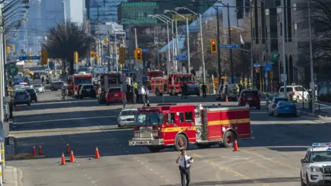 EPA Toronto police and emergency crews can be seen along Yonge Street in northern Toronto, Canada, 23 April 2018