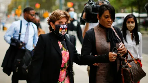 Reuters Lawyer Gloria Allred (L) and a relative of Jocelyn Savage pictured outside the Brooklyn federal court on Wednesday