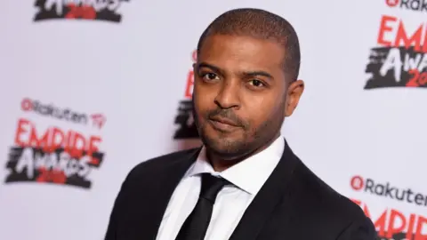 Getty Images Noel Clarke pictured on a red carpet