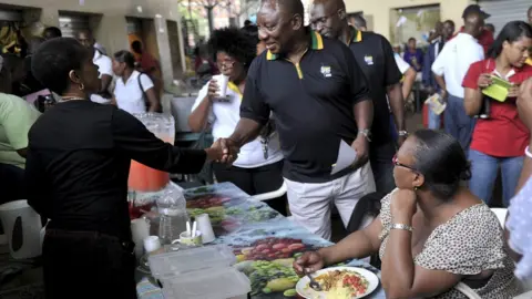 Getty Images Cyril Ramaphosa meets informal traders on January 10, 2013, in Pietermaritzburg, South Africa