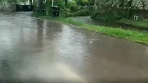 Handout Flooding in the streets of Bishop Monkton