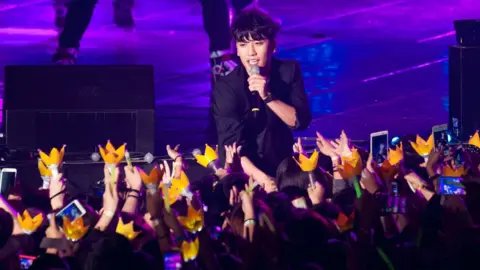 Getty Images Seungri on stage in October 2013