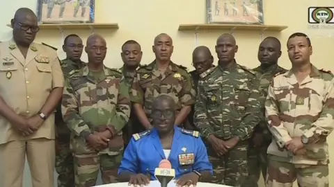 AFP Niger soldiers announcing coup on national TV, 26 Jul 23