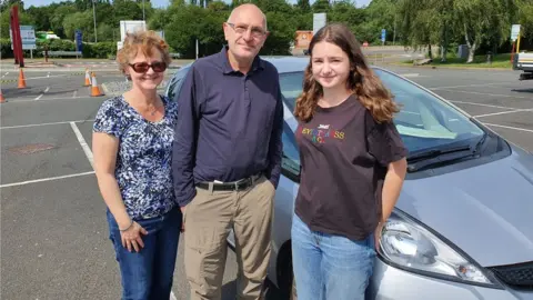 BBC Higher education teacher Thomas Despositos, a German national, with wife Julia Turrell and daughter Isabella