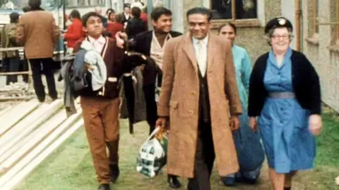 BBC Ugandan Asian refugees arriving at Greenham Common