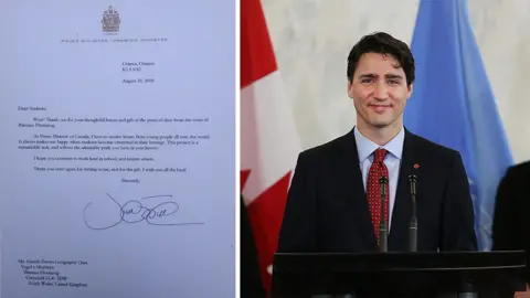 Gareth Williams/Getty Images A picture of Canadian Prime Minister Justin Trudeau and a copy of the letter he sent to the school