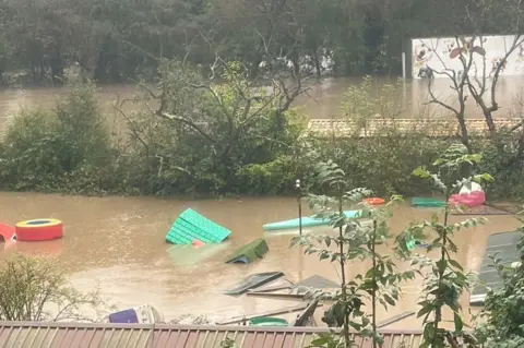 Rose Cottage Doggy Daycare Flooded paddock next to River Rother