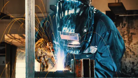 Getty Images welder at work