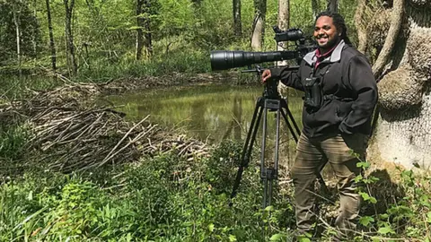 BBC/Remarkable Television Hamza Yassin with his camera