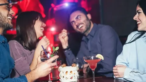 Getty Images Young people drinking alcohol