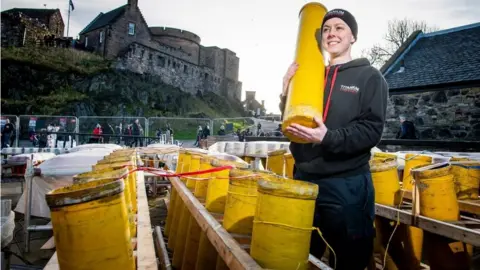 Ian Georgeson Lynn Wiseman, Pyrotechnician from Titanium Fireworks prepares for Edinburgh's Hogmanay