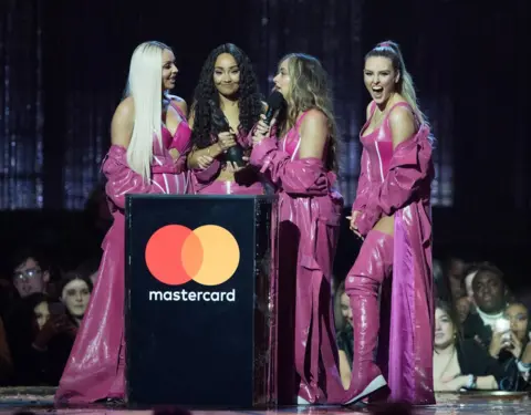 Getty Images Little Mix win a Brit Award