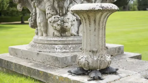 National Trust Images/James Dobson Tortoises under garden urns