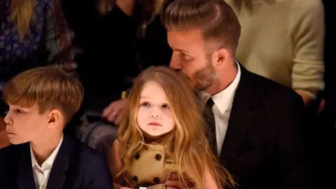 Getty Images Harper Beckham with Father David Beckham