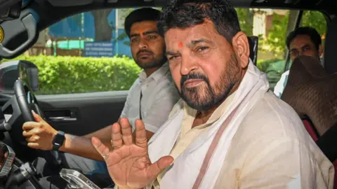  Brij Bhushan Sharan Singh, Ex-WFI chief leaves the Rouse Avenue Court after appearing in an alleged sexual harassment case at DDU Marg on April 18, 2024 in New Delhi, India.