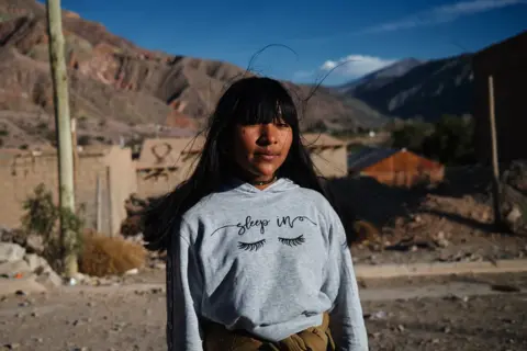 NATALIA FAVRE Portrait of Gabriela, a 13-year-old girl, during the roadblock in Purmamarca, where native communities have been demonstrating for almost two months in defence of water and the right to their lands and against the constitutional reform promoted by Governor Morales, on June 22, 2023.