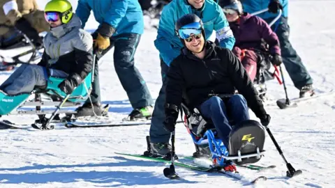Reuters Prince Harry, Duke of Sussex, practices sit-skiing during a visit to the training camp for the Invictus Games Vancouver Whistler 2025, in Whistler, British Columbia, Canada February 14, 2024