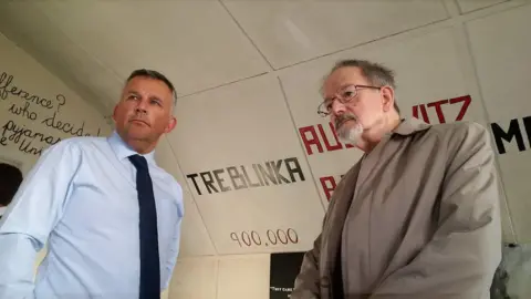 DEPARTMENT OF JUSTICE Dr Stern visiting the Holocaust exhibit at Magilligan