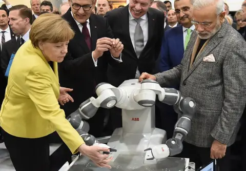 Getty Images world leaders play with robots