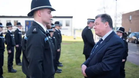POLICE AND CRIME COMMISSIONER FOR HERTFORDSHIRE David Lloyd with an officer