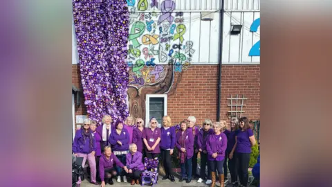 Timms Media Poppies with people stood below