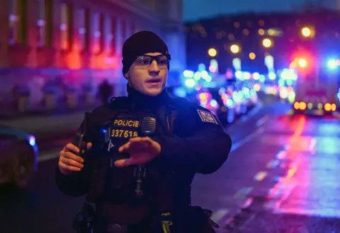 CTK/Profimedia/REX/Shutterstock Police secure area after a shooting at the Faculty of Arts at Charles University in Prague has left at least 15 people dead and 24 injured.