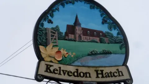 Geograph/Bikeboy Kelvedon Hatch village sign