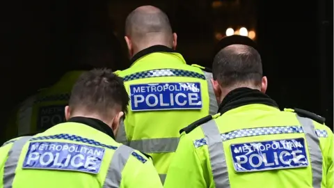 ANDY RAIN/EPA-EFE/REX/Shutterstock Metropolitan Police officers