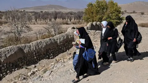 Getty Images Afghan female students return to university on 2 Feb, 2022