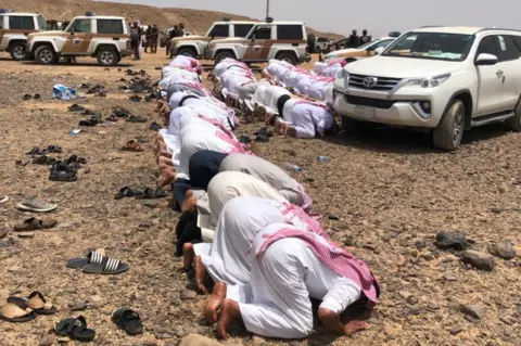 Alya Abutayah Alhwaiti People pray at the funeral of Abdul Rahim al-Huwaiti in Saudi Arabia on 22 April 2020