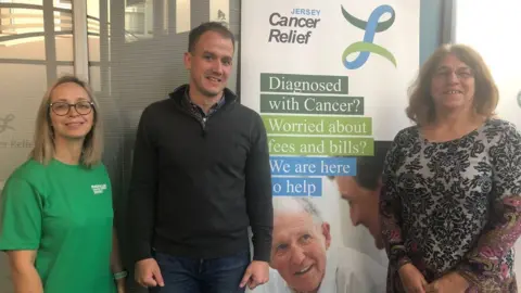 BBC Gordon Hunt with Jersey Cancer Relief workers