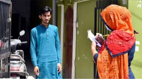 BBC ASHAs have been conducting household surveys to contain the virus