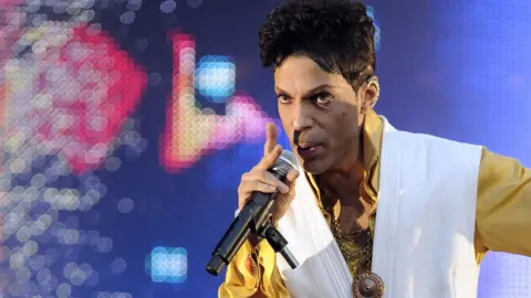 AFP File photo from 2011 shows US singer and musician Prince performing at the Stade de France in Saint-Denis, outside Paris