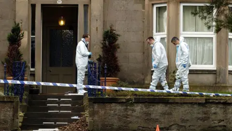 PA Media Forensics officers at the house