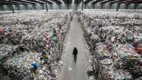 Getty Images A Melbourne warehouse full of plastic to be recycled