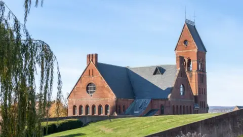 Getty Images Cornell's campus featuring a building