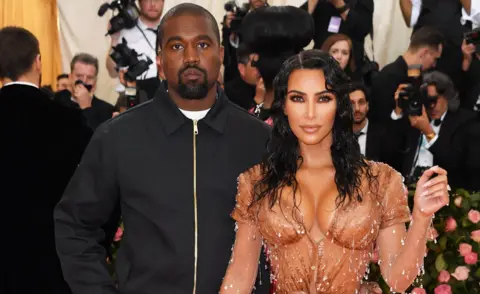 Getty Images Kanye West and Kim Kardashian